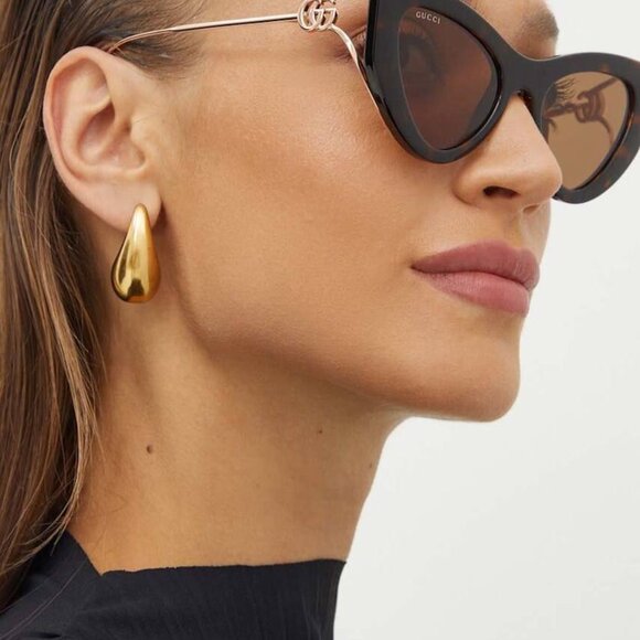 Gucci GG1565S 003 Cat Eye Sunglasses - Shiny Ivory Gold/Solid Red main image 5